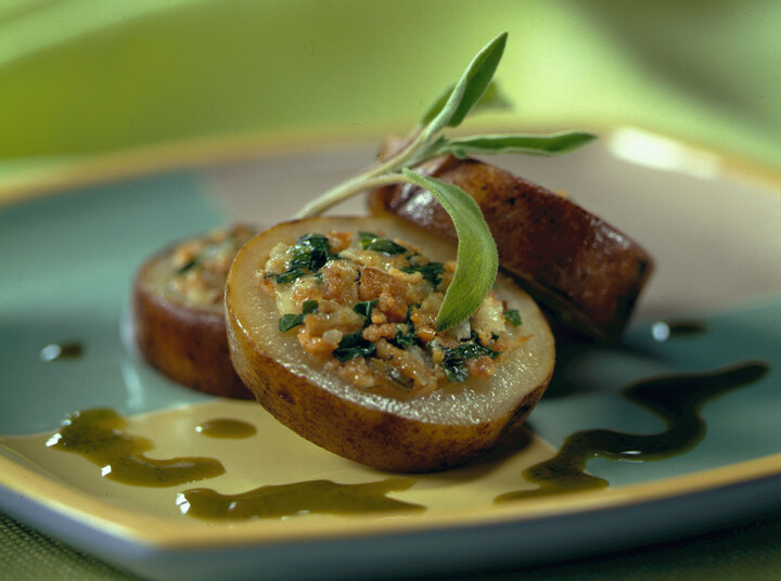 Roasted Idaho® Potato Medallion with Spinach, Brie and Spicy Pork Sausage