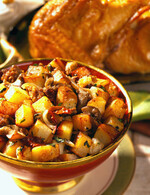 Lemon-Sage Roast Chicken with Sausage-Mushroom-Idaho® Potato Stuffing 