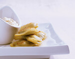 Idaho® Potato & Short Rib Pierogi with Caramelized Onion Sour Cream