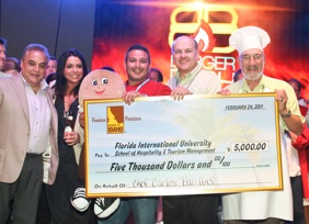 Lee Schrager and Rachael Ray congratulate Chef Carlos Barillas (center),  along with Frank Muir and Mr. Food 