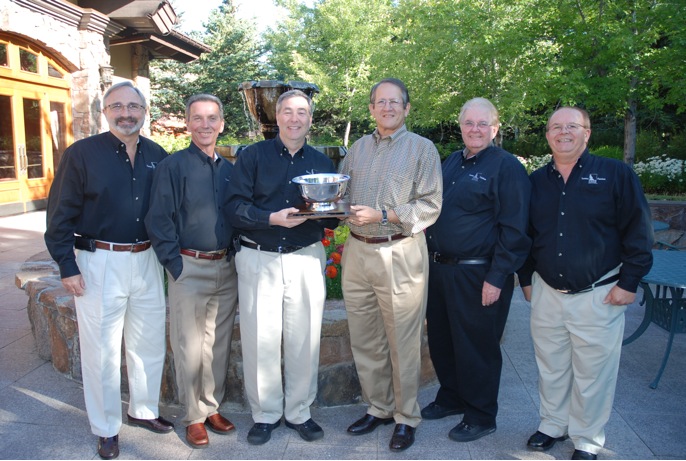 The Idaho Potato Commission’s (IPC) Retail Promotion Directors and  Seth Pemsler, Vice President, Retail/International, IPC accept the  Produce Business Marketing Excellence Award from Eric Nieman,  Associate Publisher at Produce Business for the IPC’s popular Comic  Book campaign. Pictured left to right are Bill Savilonis, Kent Beesley,  Seth Pemsler, Eric Nieman, Larry Whiteside and Ken Tubman.